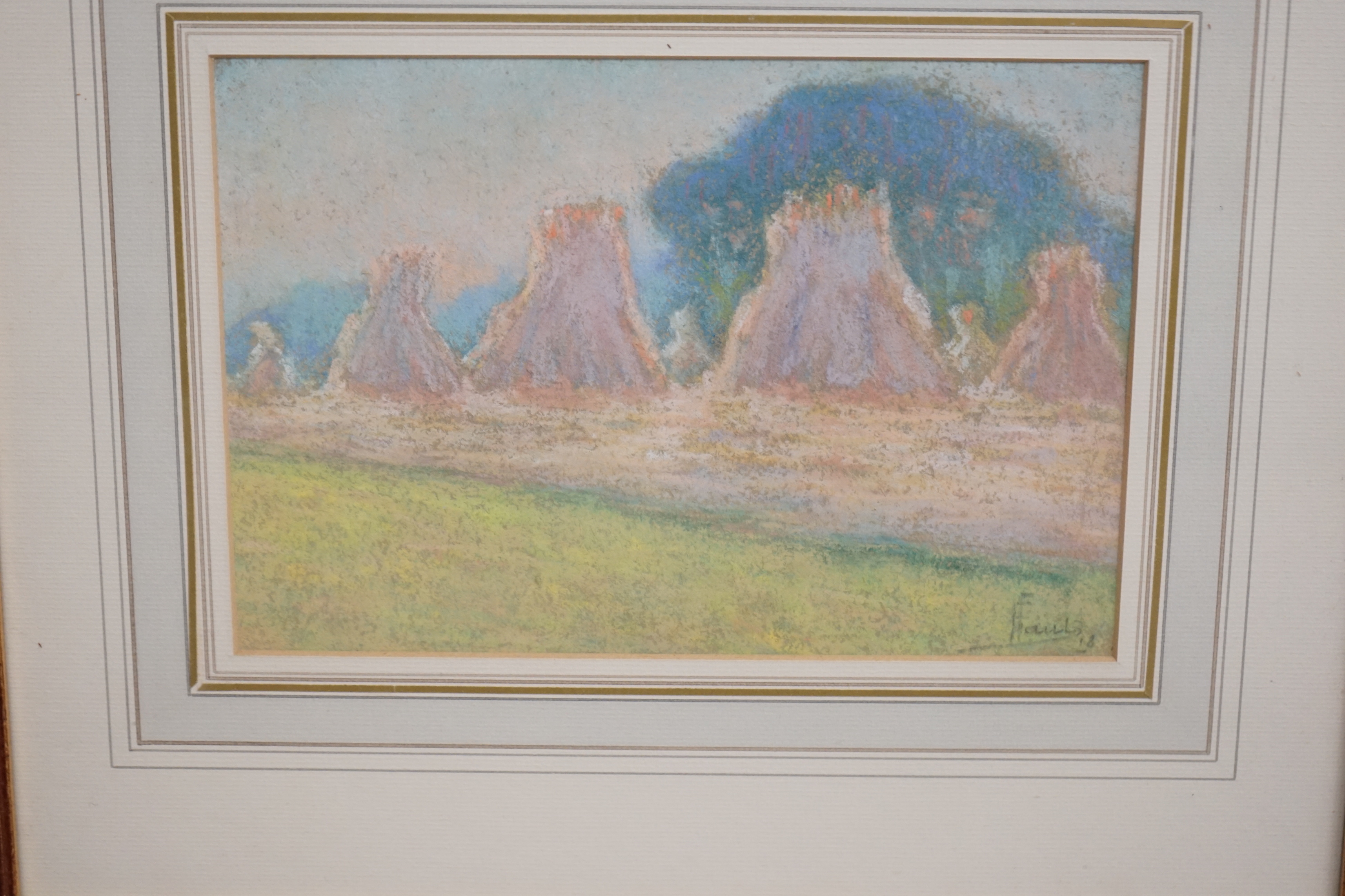 Ernest Faut (1879-1961) Impressionist pastel, Rural landscape with hayricks, signed, inscribed in ink verso, 15 x 23cm